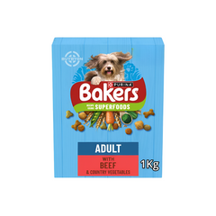 A pack of Bakers Beef with Vegetables Dry Dog Food, 1kg, sitting on a table with a happy dog looking at it.