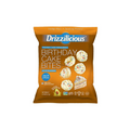 A bag of Drizzilicious Birthday Cake Bites mini rice cakes, featuring a bright orange-brown packaging with blue and white branding and images of the cake-topped bites.
