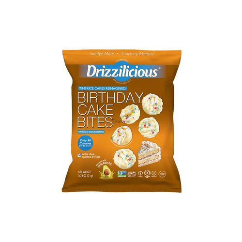 A bag of Drizzilicious Birthday Cake Bites mini rice cakes, featuring a bright orange-brown packaging with blue and white branding and images of the cake-topped bites.