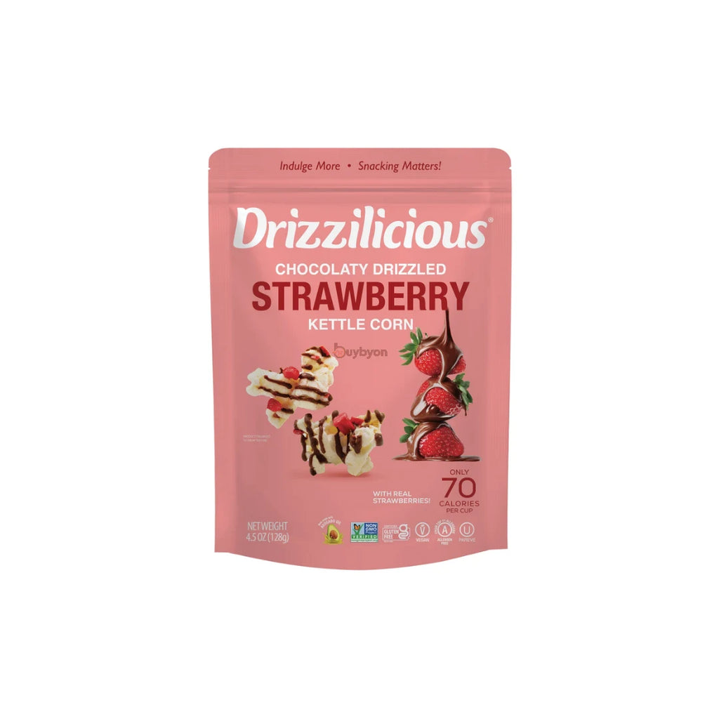 A pink stand-up pouch of Drizzilicious Strawberry Kettle Corn on a plain white background.