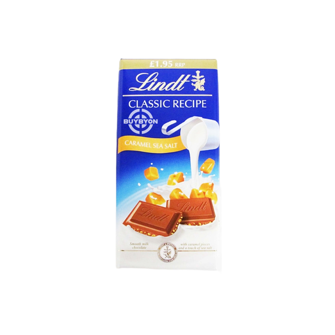 Lindt Classic Caramel & Sea Salt - 100g, featuring milk chocolate with caramel pieces and a hint of sea salt.