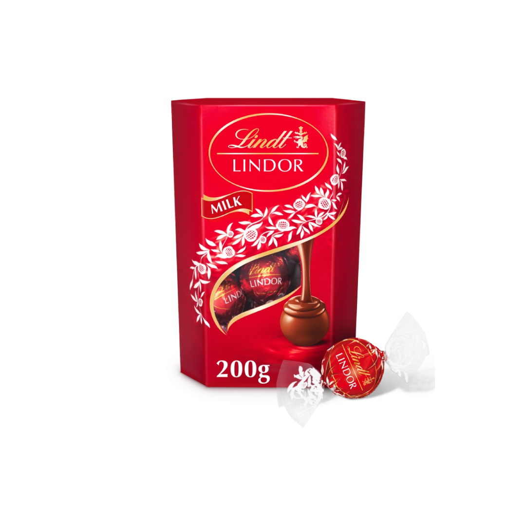 Lindt Lindor Milk Chocolate Truffles Box - 200g, featuring smooth milk chocolate shells with creamy, melt-in-the-mouth centres.