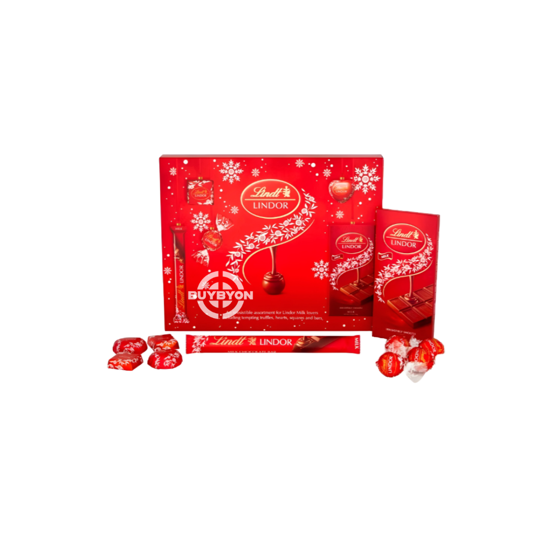 Lindt Lindor Milk Selection Box - 234g featuring an assortment of premium Lindor milk chocolates in a festive, holiday-themed box.