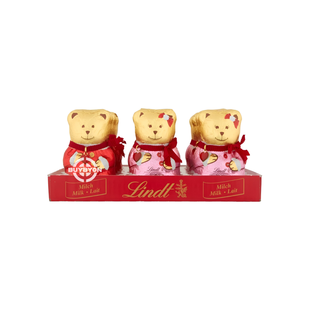 Lindt Teddy Christmas Milk Chocolate - 100g, gold-wrapped milk chocolate in a teddy bear shape with a red ribbon, perfect for festive gifting.