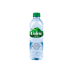 Volvic Natural Mineral Water 500ml bottle with a green label and clear design, highlighting its purity and volcanic origins.